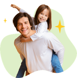 A man is smiling while carrying his cheering daughter on his back