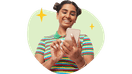 Woman smiling while checking her phone