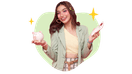 Woman smiling while holding a calculator in her left hand and a small piggybank in the other hand, with sparkles floating beside her.