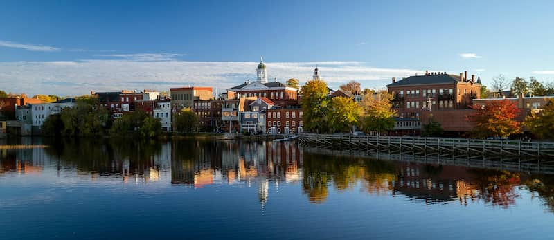 Buildings along a river in Exeter, New Hampshire.