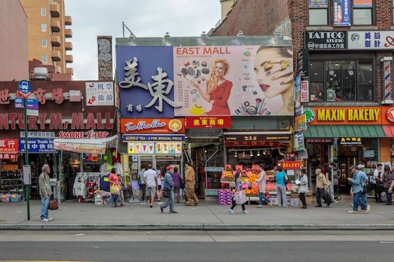 Street side vendors and stores in Queens.