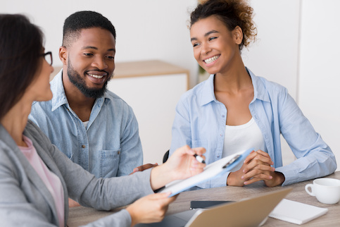 Couple meeting with realtor.