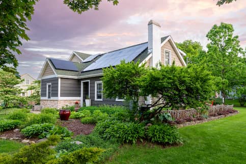 Cape Cod house with solar panels.