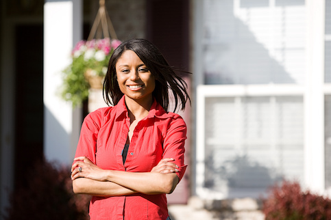 Cheerful Woman Outside Of Home