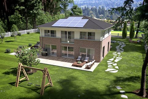 Half red brick house with large backyard and with solar panels on its roof.