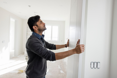 Male Inspecting Construction Site