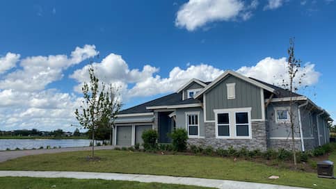 A new home built by the neighborhood pond.