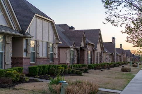 New townhomes in Arkansas at sunset.