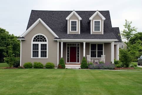 Simple gray Cape Cod style vacation home.