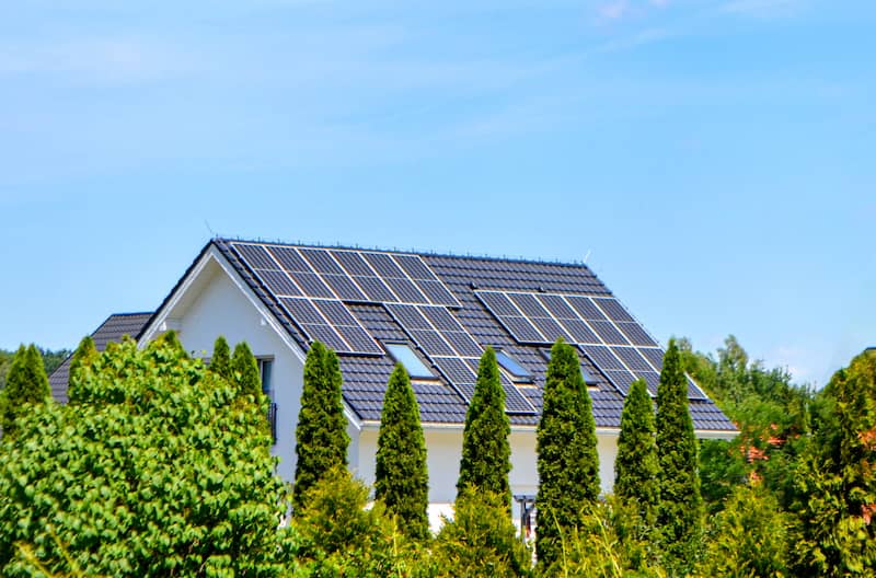 Solar panels on top of a residential home.