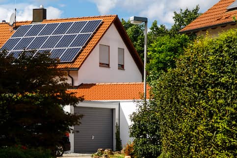 Solar panels on the tiled roof of a building 