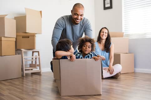 Young family moving into new house.