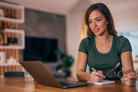 Young woman checking her credit score online.