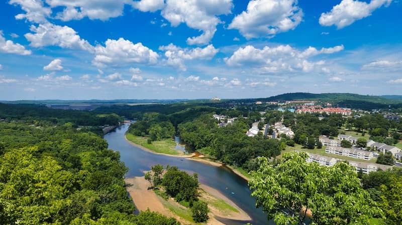  Lush green trees, river and view of Branson homes on the right.