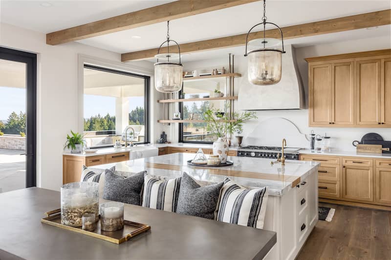 Modern farmhouse dining nook beside kitchen.