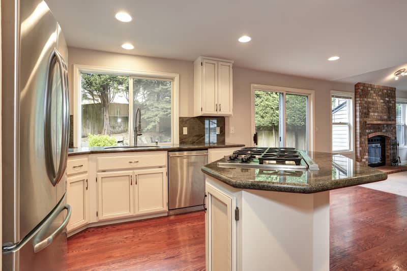 Modern farmhouse kitchen with kitchen island.