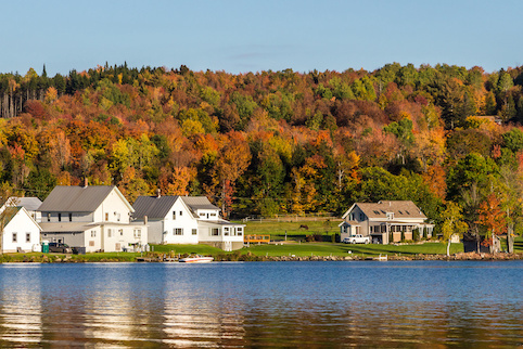 Houses on a lake in autumn.