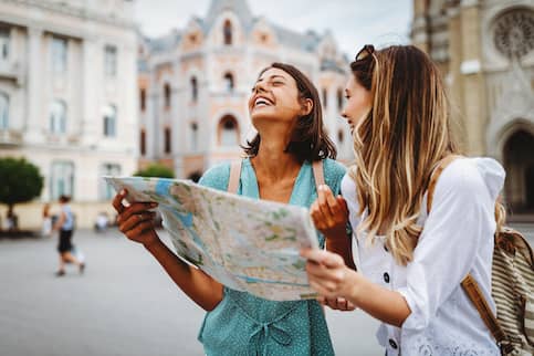 girls looking for direction in the city