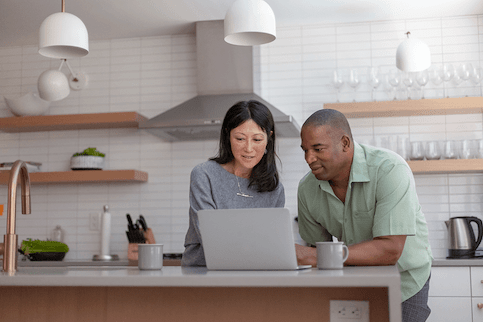 Couple reviewing home insurance policy 