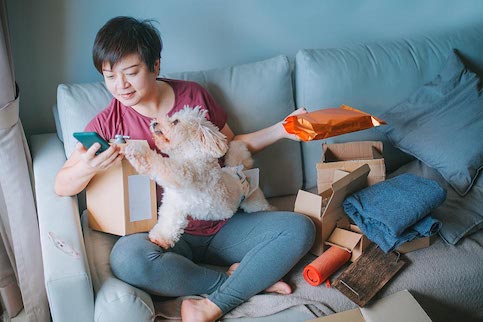 Man shopping on his phone using a buy now, pay later plan.