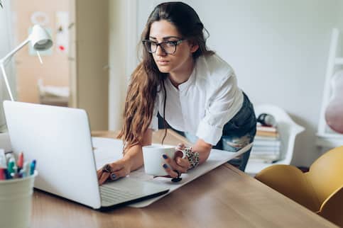 Woman checking her APR online. 