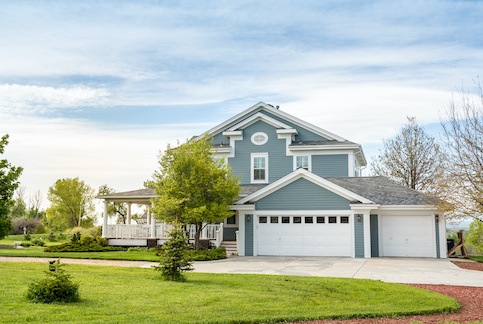 Beautiful suburban blue house.