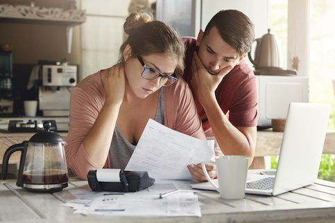 Couple Looking At Their Credit Statements