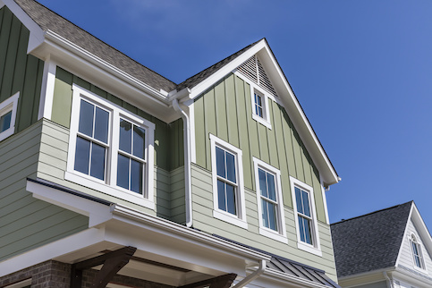 Top of Green and White Suburban House