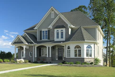 grey and white suburban brick house