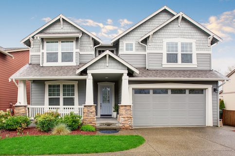 Grey house with garage attached.