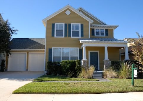 Big yellow home for sale.