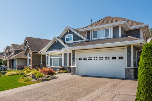 Real Estate Investment Home Blue House With Front Yard