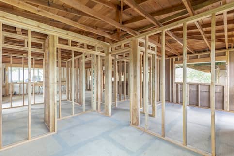 Newly built interior framing for a house.