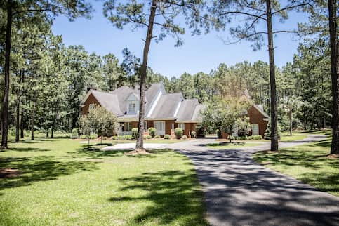 Home at end of wooded lot. 