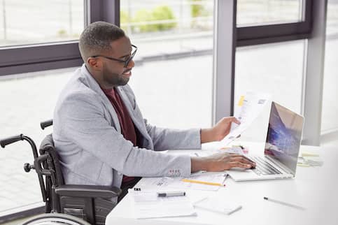 Male With Disabilities Working From Home