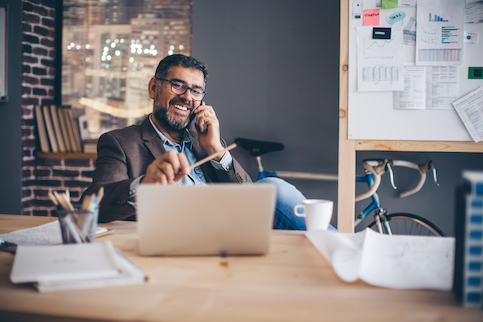 Man working at a desk.