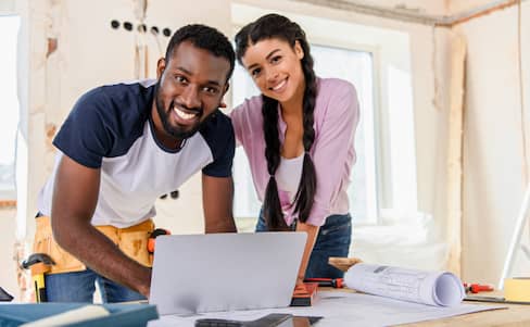 Interracial couple planning renovation.