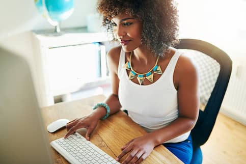 Woman Shopping For A Mortgage Online And Checking Credit Score 