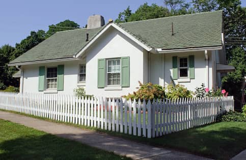 corner house with picket fence