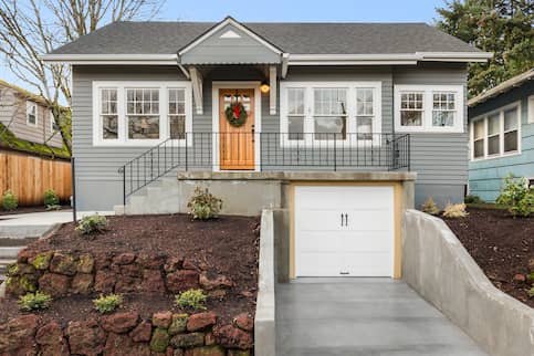 House with in-ground driveway.