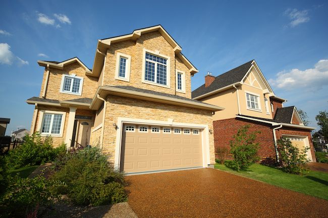 house on hill with room over garage