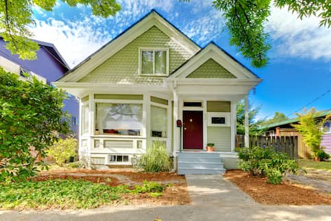 small yellow/green house