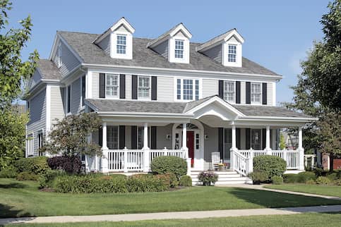 Family Home With Dormers And Large Porch 