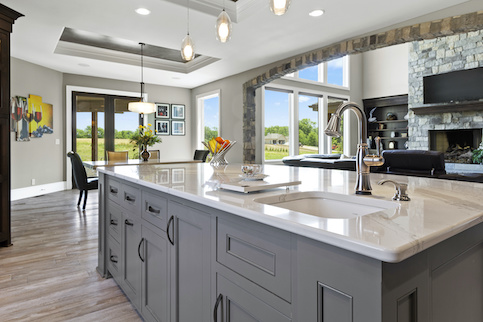 Upscale open kitchen dining room combo.