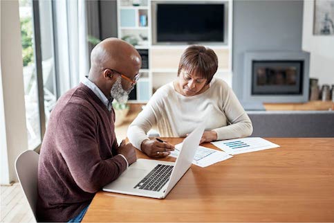 couple discussing homeowners insurance