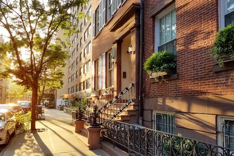 Line of old brick apartments in New York.