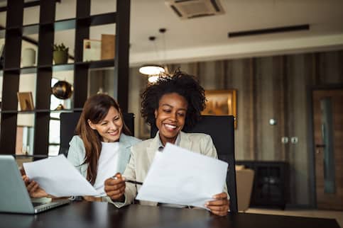 Two Women Working