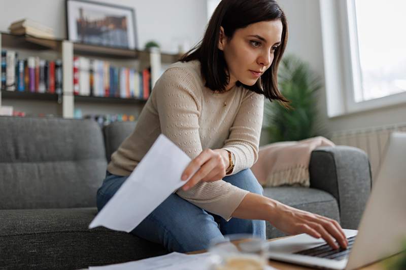 Woman researching options of buying a home with student loans